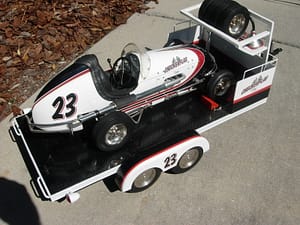 Scale model race car and trailer